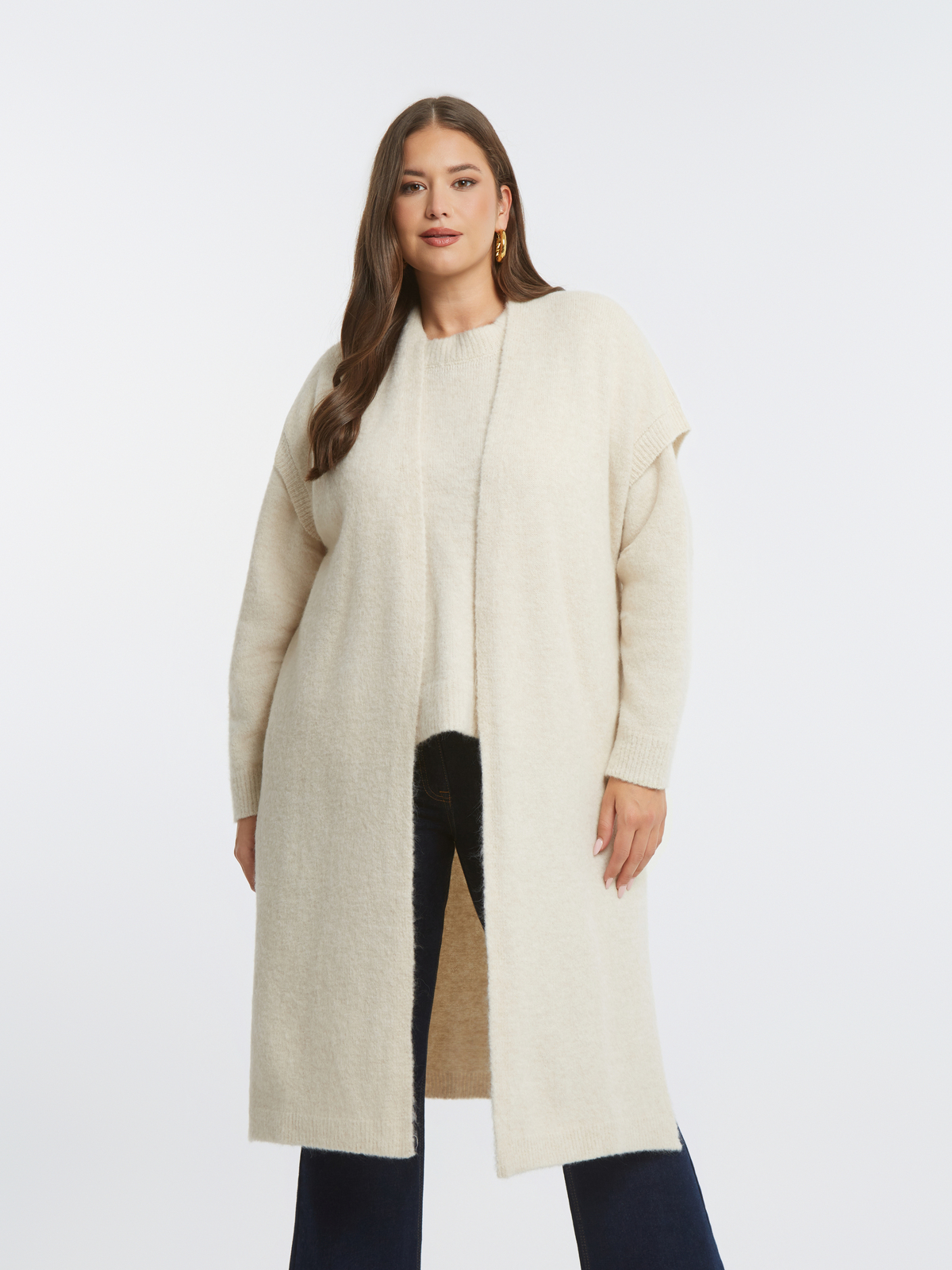 Κοντομάνικο μακρύ πλεκτό γιλέκο φωτογραφία