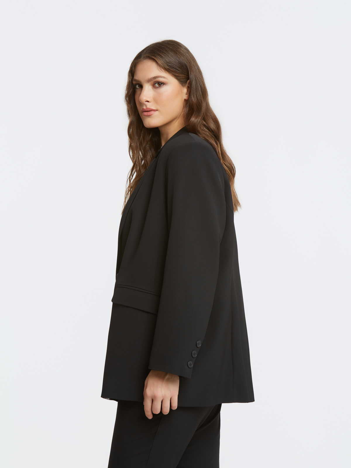 Μονόχρωμο σακάκι με εμπριμέ φόδρα και κουμπί φωτογραφία