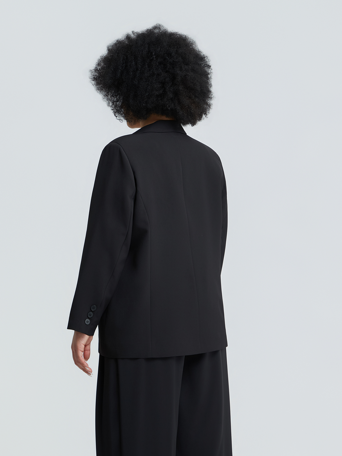 Μονόχρωμο σακάκι με εμπριμέ φόδρα και κουμπί φωτογραφία