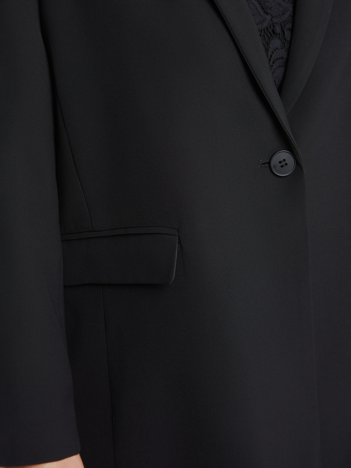 Μονόχρωμο σακάκι με εμπριμέ φόδρα και κουμπί φωτογραφία