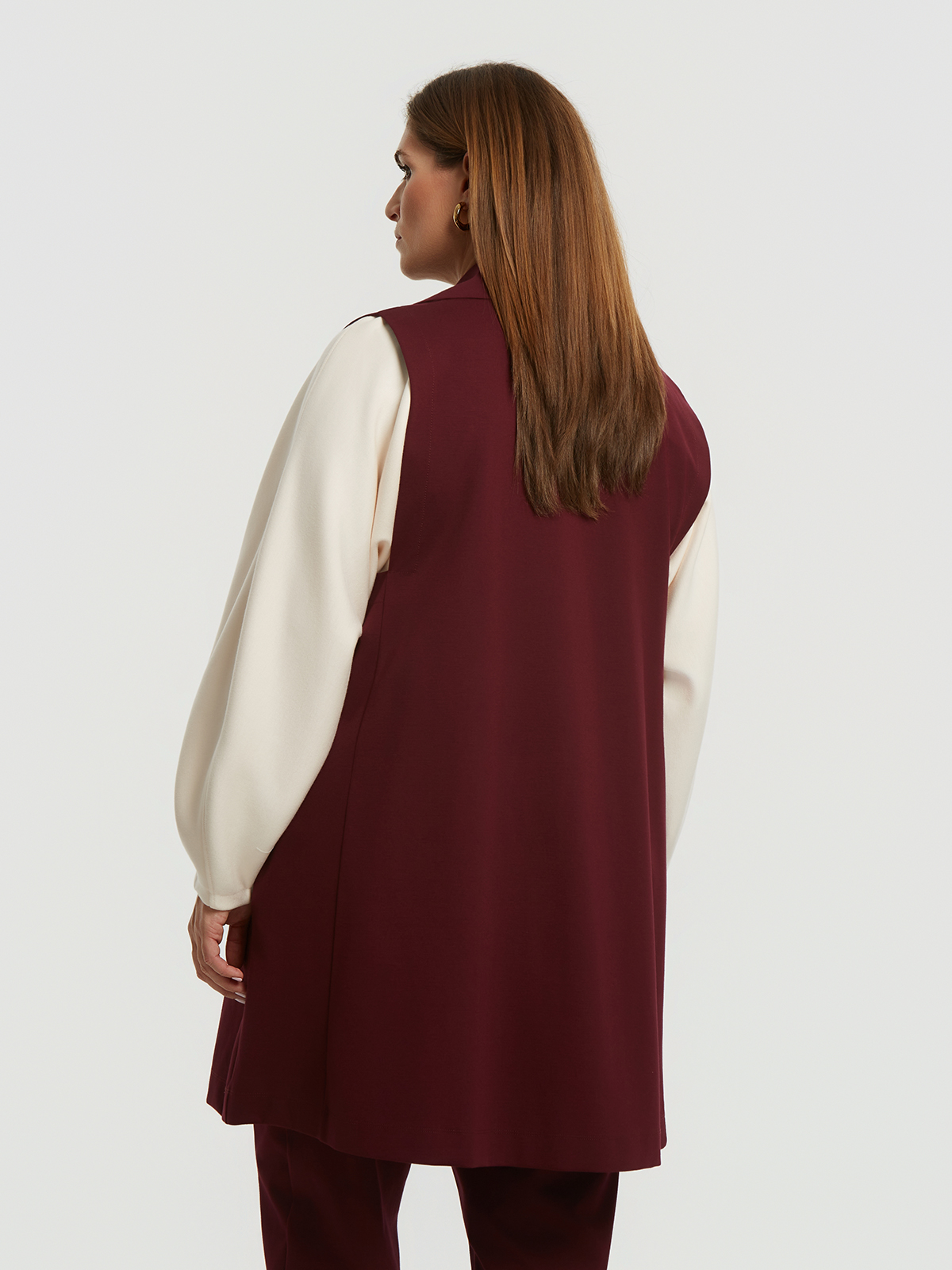 Μακρύ γιλέκο με ρέλι σε αντίθεση φωτογραφία