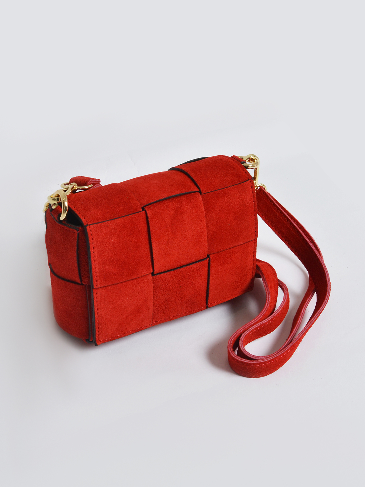 Δερμάτινη mini τσάντα με πλεκτό σχέδιο φωτογραφία