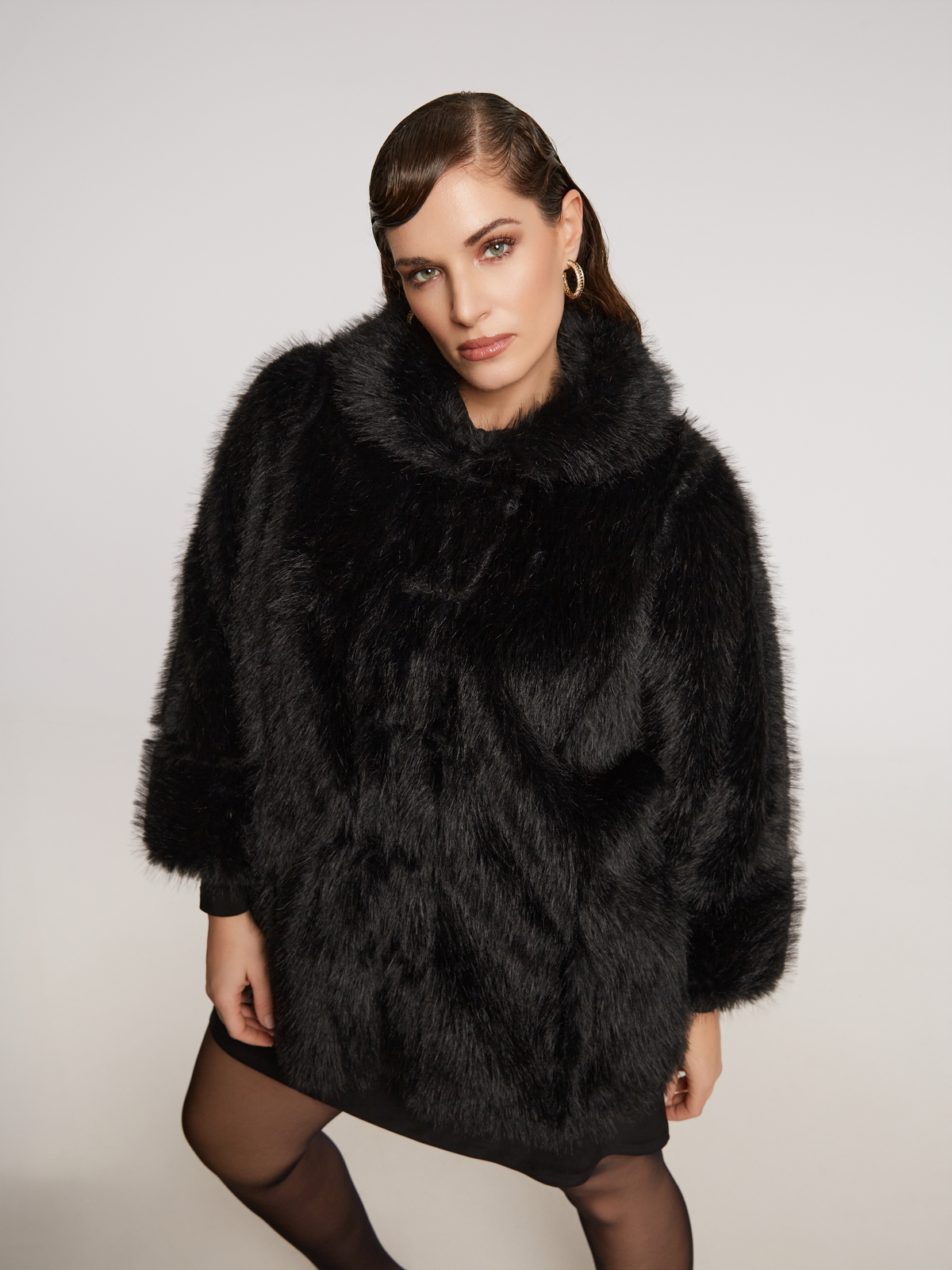 Παλτό από faux γούνα φωτογραφία